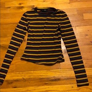 Cute Long sleeve shirt. Just a little cropped.